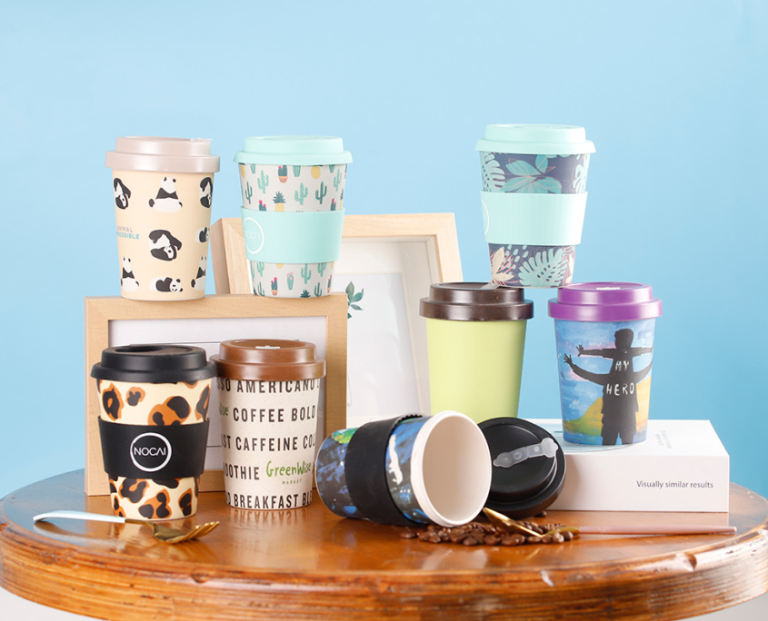 https://mannbiotech.com/wp-content/uploads/2023/02/Customized-Reusable-Bamboo-Coffee-Cups-with-Lids-12oz-350ml-845x684.jpg